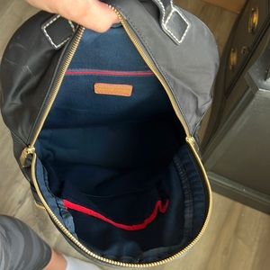 Black Tommy Hilfiger backpack with gold accents